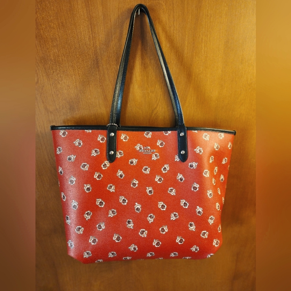 Coach reversible tote with matching wallet.